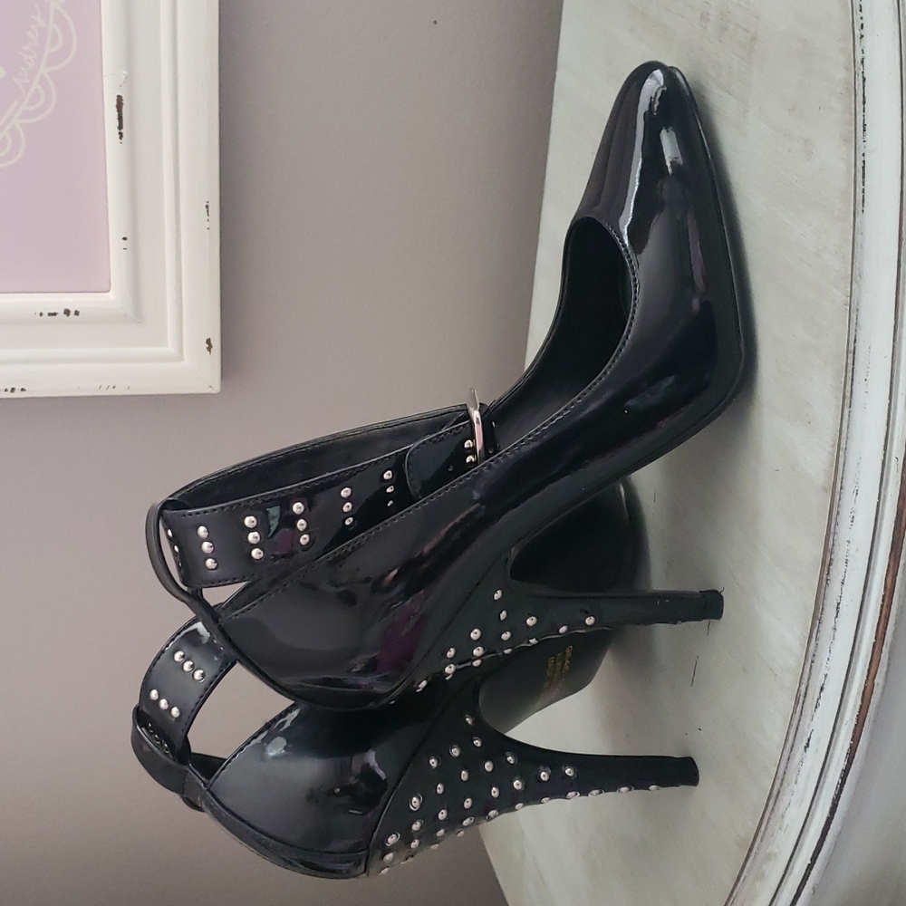 Black patent heels with studs and ankle strap size 6